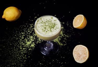 Ingredients for Creamy Matcha cocktail: gin, lillet, matcha syrup, lemon juice, and egg white
