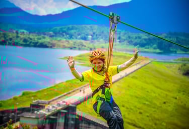 Thrilling ride on the longest zip line at Karapuzha Adventure Zone, offering spectacular views of th