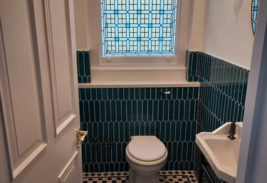 green tile bathroom