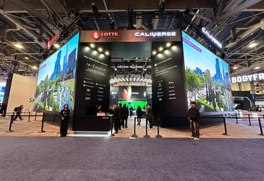 a booth with a large display of a video game