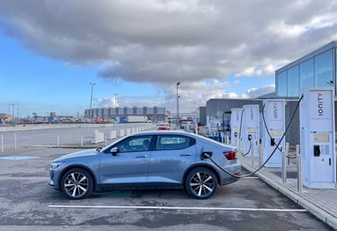 Electric vehicle charging at smart station with real-time monitoring and AI-driven incident alerts