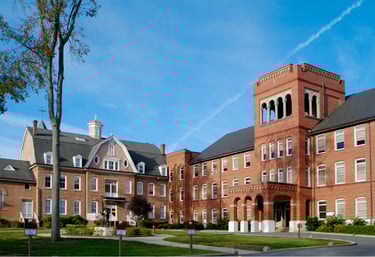School or university campus with red brick architecture, representing access control and student safety management.