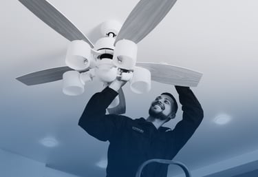 Hyperion electrician changing a fan at a customers house