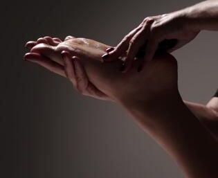 a woman is shown in a photo while she is doing a massage