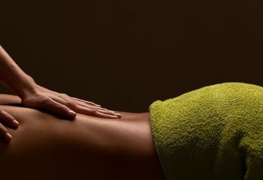 a woman getting a massage at a spa