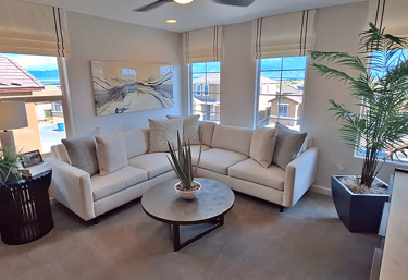 a living room with a couch and a table