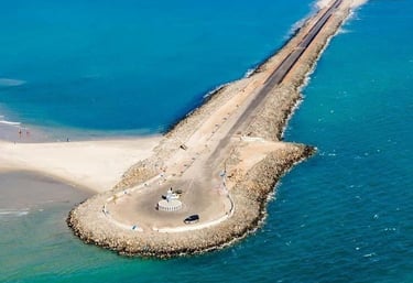 Scenic road and causeway over blue sea leading to Rameswaram, ideal for pilgrimage tours .