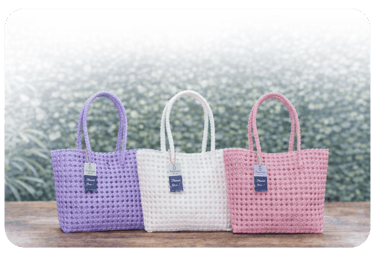 Handwoven tote bags handmade from recycled plastic with durable and elegant design