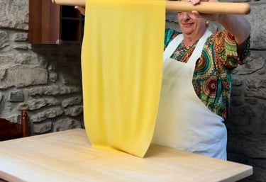 Alessandra Spisni making handmade sfoglia, a timeless craft of Emilia-Romagna cuisine