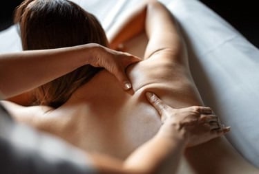 a woman getting a deep tissue massage