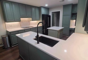 Quartz kitchen counters with matching full-height backsplash