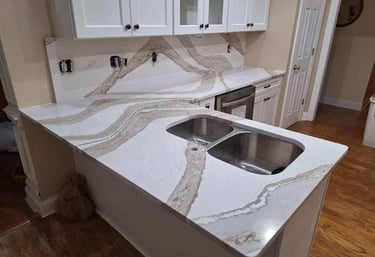 Quartz countertop with subtle marbling in transitional kitchen design
