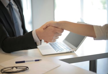 shaking hands, reaching an agreement, helping with implementation and settlement of prg with 