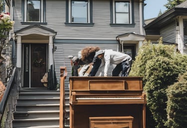 a man and a woman are playing piano together