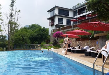 Enjoy a refreshing swim at The Yangshuo Li River Resort's pool