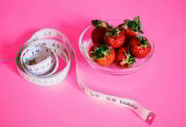 a bowl of strawberries and measuring tape measure tape measure tape measure tape measure tape