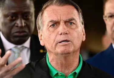 a man in a suit and tie is talking to a reporter