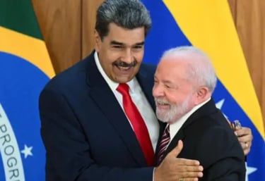 a man in a suit and tie is hugging a man in a suit