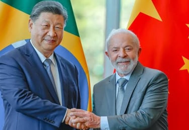 a man in a suit and tie standing next to a flag