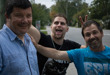 a group of men standing outside jericho road ministries