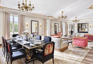 Royal Suite Dining & Lounge – Opulent dining and living area with classic décor and plush furnishings.