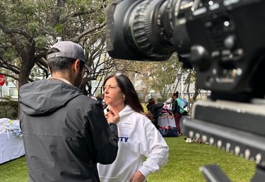 nonprofit client prepares for television interview after media coaching