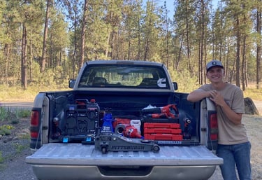 Elias in front of his tools