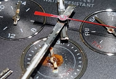 a close up of a watch with a watch face