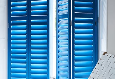 Full height plantation shutters in contemporary kitchen