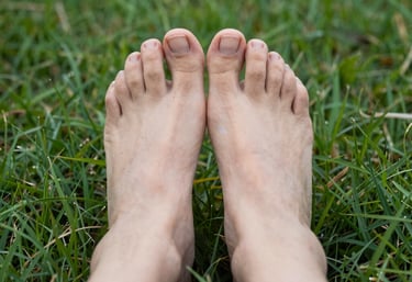 Close-up of a podiatrist gently treating a diabetic foot with precision and care.