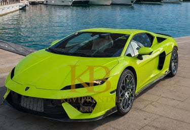 A bright lime green Lamborghini supercar parked on a stone pier at a luxury marina with yachts.