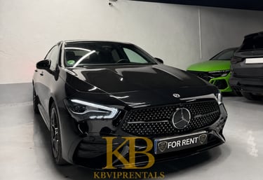 Black Mercedes CLA luxury car for rent in Marbella showroom with LED headlights and KB VIP Rentals branding.