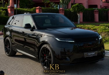 Black luxury Range Rover Sport rental parked outside a Mediterranean villa in Marbella.