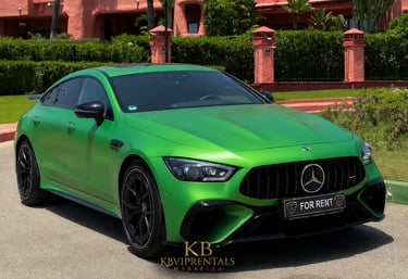 A lime green Mercedes-AMG GT 63 S luxury sports car for rent parked in Marbella.