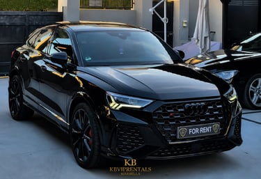 Sleek black Audi RS Q8 luxury SUV for rent, parked in Marbella with high-gloss finish and LED headlights.