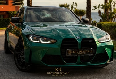 Front view of a dark green BMW M3 luxury sports car rental parked in Marbella at sunset.