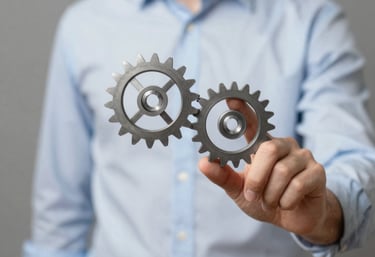 a man riding a skateboard down a street next to tall buildings