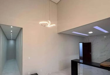 a room with a table and a table with a lamp