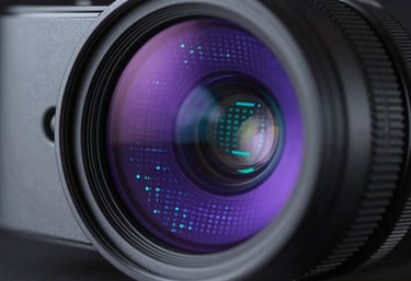 An artistic macro photograph of a high-precision optical lens from an augmented reality device, reflecting a complex grid of deep purple and cyan data.