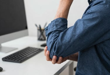 Doctor consulting a patient with a focus on tendon pain assessment.