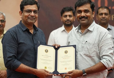 Artisans receiving physical certificates at an event, South Asian / Indian context, warm lighting, celebratory and professional atmosphere.