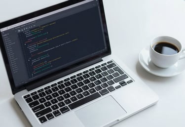 A top-down view of a modern workstation with a clean laptop displaying lines of clean code and a cup of black coffee. Corporate professional look with #F8F9FA and #4A5568.