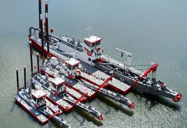 a tugboat docked at a dock with a tugboat