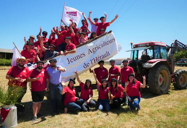 a group of people standing around a large banner