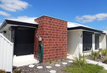 Pre-purchase building inspector assessing home in Perth for defects and safety issues.