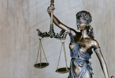 A statue of a lady with a scale justice justice and justice