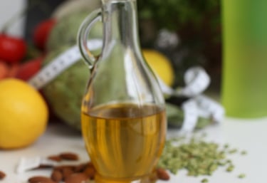 a bottle of olive oil on a table