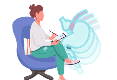 a woman sitting in a chair with a laptop and a tablet