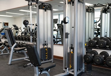 A collection of fitness study materials and equipment neatly arranged.