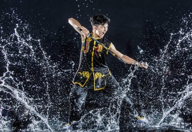Las Vegas martial artist yelling in a fighting pose with double broadswords
